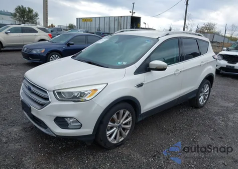 2017 Ford Escape Titanium z USA, uszkodzony, nr VIN 1FMCU0JD3HUC58564